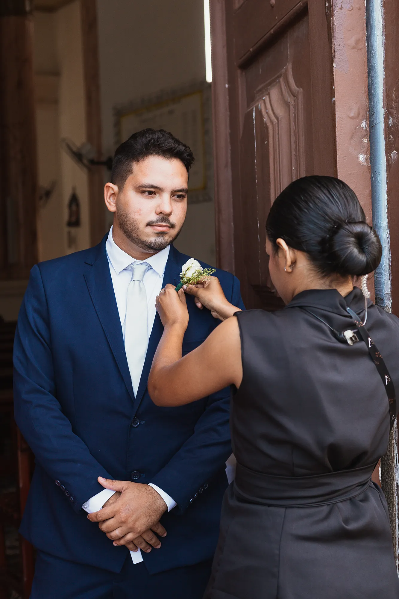 Assistente dos noivos durante a celebração